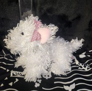 Fluffy White Plush Dog with Pink Bow